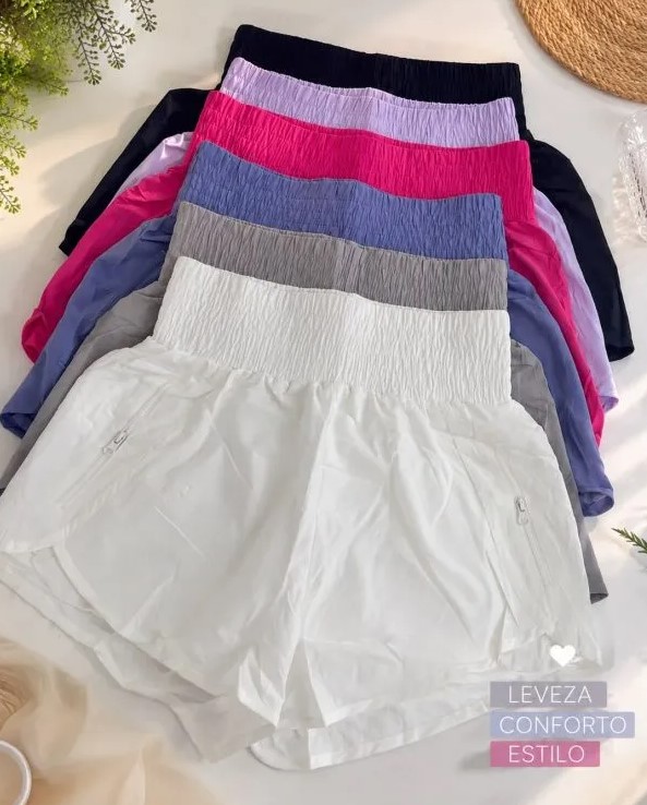 Short duplo com zíperes